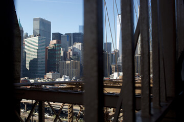 View of the Financial District  and Wall Street skyline from the Brooklyn Bridge in Manhattan New...
