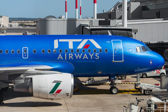Rome, Italy, September 26, 2023: ITA Airways Airbus A319-111 with registration EI-IMS shown at a gate at Fiumicino, Leonardo Da Vinci International Airport.