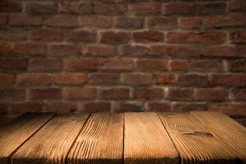 wood table green wall background with sunlight window create leaf shadow on wall with blur indoor...