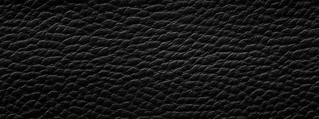 Seamless dark black leather background pattern. Tileable closeup textile texture of soft plush luxury cow hide or other creature or animal skin. A high resolution fashion backdrop - obrazy, fototapety, plakaty