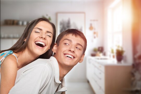 Young happy couple hugging at home, AI generated image