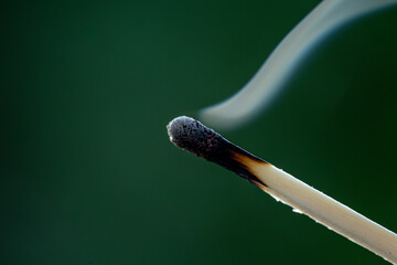 smoking esmoldering extinguished matchxtinguished match