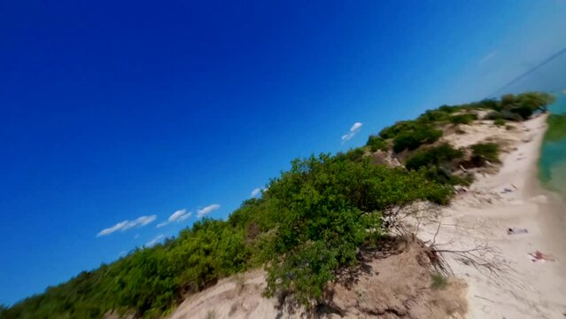FPV, Ukraine, View from the mountain Pivikha on the Kremenchuk water reservoir near Svitlovodsk, Kirovograd region, Ukraine. Natural background in a sunny summer day.