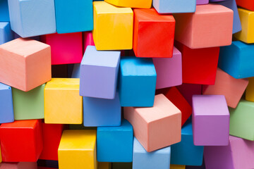 Close up of colorful wall of blocks of different colors.