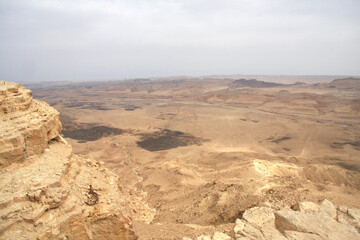 Open Negev Desert in South Israel. Sand dunes with dry air on a summer day.
