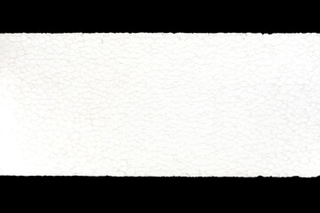 Empty piece of white styrofoam, isolated on black