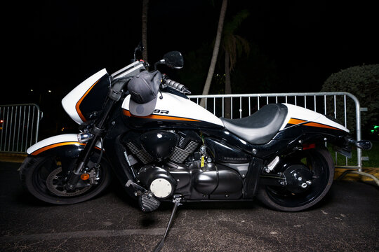 Night flash photo of a Suzuki Boulevard cruiser motorcycle