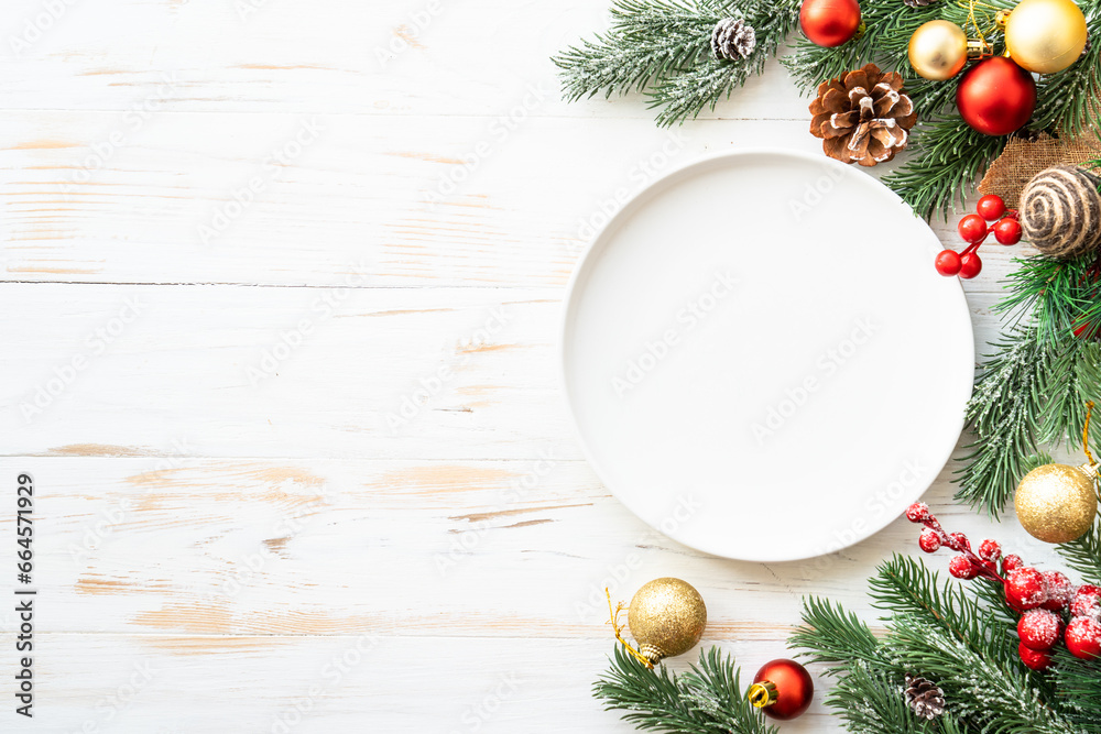 Wall mural christmas table with holiday food background.