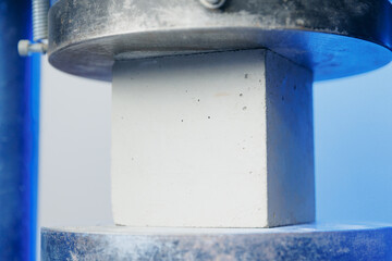 Cube cement concrete tested in shape damage from test compression or strength, UTM crash