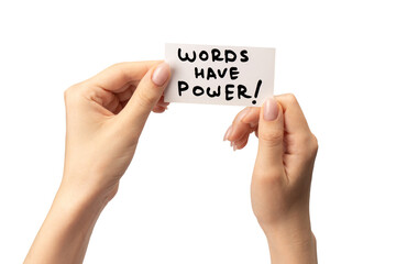 Words have power text on a card in a woman hand isolated.