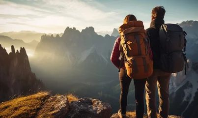 Photo sur Plexiglas Himalaya Couple hiker traveling, walking alone Italian Dolomites under sunset light. Woman traveler enjoys with backpack hiking in mountains. Travel, adventure, relax, recharge concept.