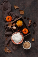 Ingredients for Homemade sweet pumpkin cinnabons, buns with cinnamon