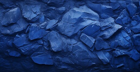 Fototapeta premium A rich, deep blue stone texture backdrop, featuring textured organic forms and saturated color field aesthetics.
