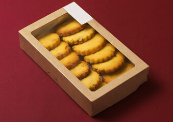 Classic round shortbread cookies in a box. Close-up	
