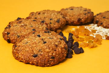 Oatmeal cookies with chocolate filling and raisins. Close-up