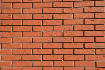 Brick red wall background. Building facade element.
