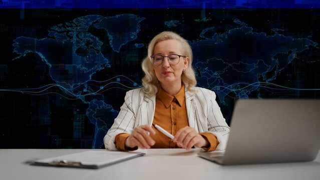 Embarrassed female TV news presenter forgot her text during studio live stream