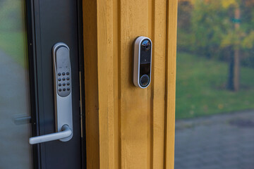 Close-up view of high-tech video doorbell. Concept of home security and surveillance. Sweden. - obrazy, fototapety, plakaty