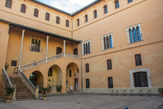 Gandia, Spain - January 9, 2023 - Courtyard view of the 14th century  Valencian Gothic style Ducal Palace of Gandia