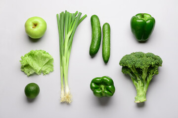 Fresh vegetables and fruits on white background