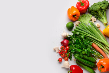 Fresh vegetables, fruits and mushrooms on white background
