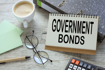government bonds open notepad with text on document folder. Business concept. - obrazy, fototapety, plakaty