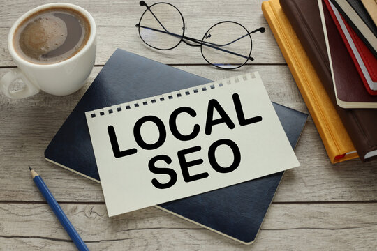 paper with text on a notepad on the desk LOCAL SEO