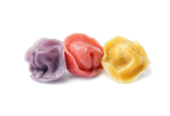 Boiled colorful dumplings on white background