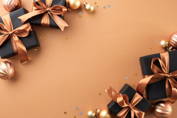 Discover the magic of selecting the ideal holiday presents. Top view shot of presents, holiday baubles, shiny confetti on terracotta background with ad space