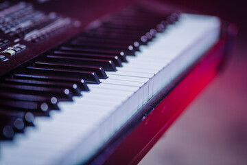 synthesizer keys close-up spotlights