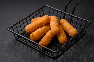 Delicious crispy cheese sticks with mozzarella, salt and spices, breaded