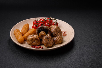 Delicious juicy whole champignons baked on the grill with salt and spices