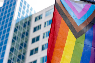 Pride flag outside corporate office - obrazy, fototapety, plakaty