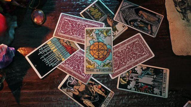 New Delhi, India - December 23, 2016. Old divination ritual reading Wheel of Fortune card predicting luck. Divination ritual forecasts chances of luck. Divination ritual foreseeing luck in life