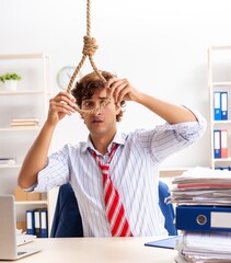 Desperate businessman thinking of committing suicide hanging