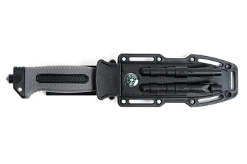Tactical knife in sheath white background.