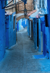 Fototapeta na wymiar Chefchaouen town in Morocco, known as the Blue Pearl, famous for its striking blue color painted medina buildings and streets, creating a unique and magical atmosphere.