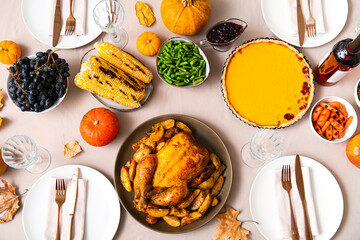 Festive table setting with tasty food for Thanksgiving Day, top view