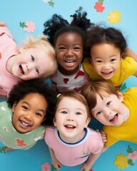 A group of young children of different nationalities play in a kindergarten