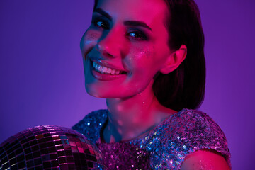 Portrait of fancy lady bachelorette smile with disco ball enjoy prom celebration isolated ultraviolet neon background © Beauty Hero