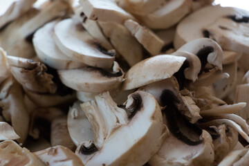 close up of a heap of sliced champignons