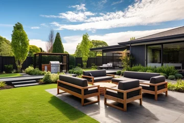 Photo sur Plexiglas Jardin Contemporary house with a sleek modern garden furniture