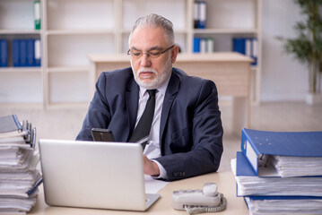 Old male employee and too much work at workplace