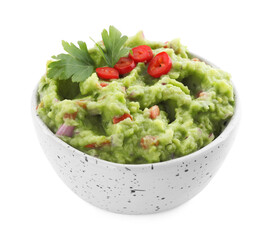 Delicious guacamole served with pepper and parsley isolated on white
