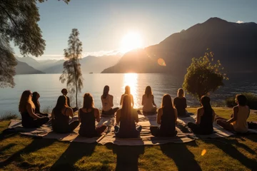 Fotobehang Yoga retreat, group session by the serene lakeside, harmony and balance. © furyon