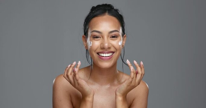 Face, skincare and happy woman apply cream in studio isolated on gray background mockup. Portrait, natural beauty and model with moisturizer, cosmetics and product for wellness, dermatology or health