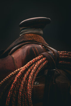 Worn Leather Western saddle with lariat 