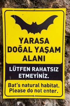 Yellow sign warning of bat&rsquo;s natural habitat in Antalya, Turkey.