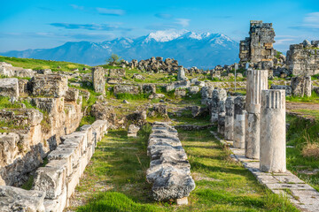 Ruins of Hierapolis ancient site in Pamukkale, Turkey. Hierapolis was an ancient Greek city located on hot springs in classical Phrygia in southwestern Anatolia.
