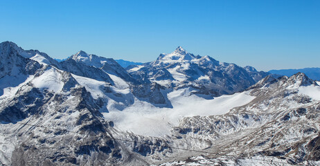 Fototapeta na wymiar Panorama of the snowy mountains in Elbrus region, Russia